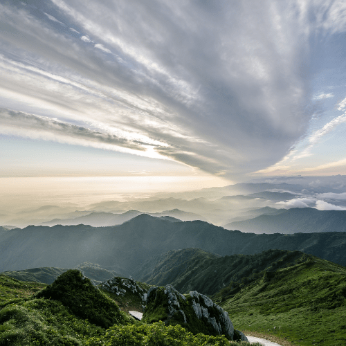 Mountain landscape with clouds and green hills